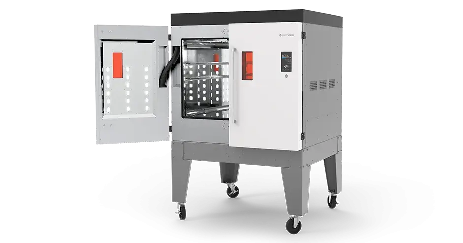 门半打开的 MDM 后处理机，可看到机器内部部件